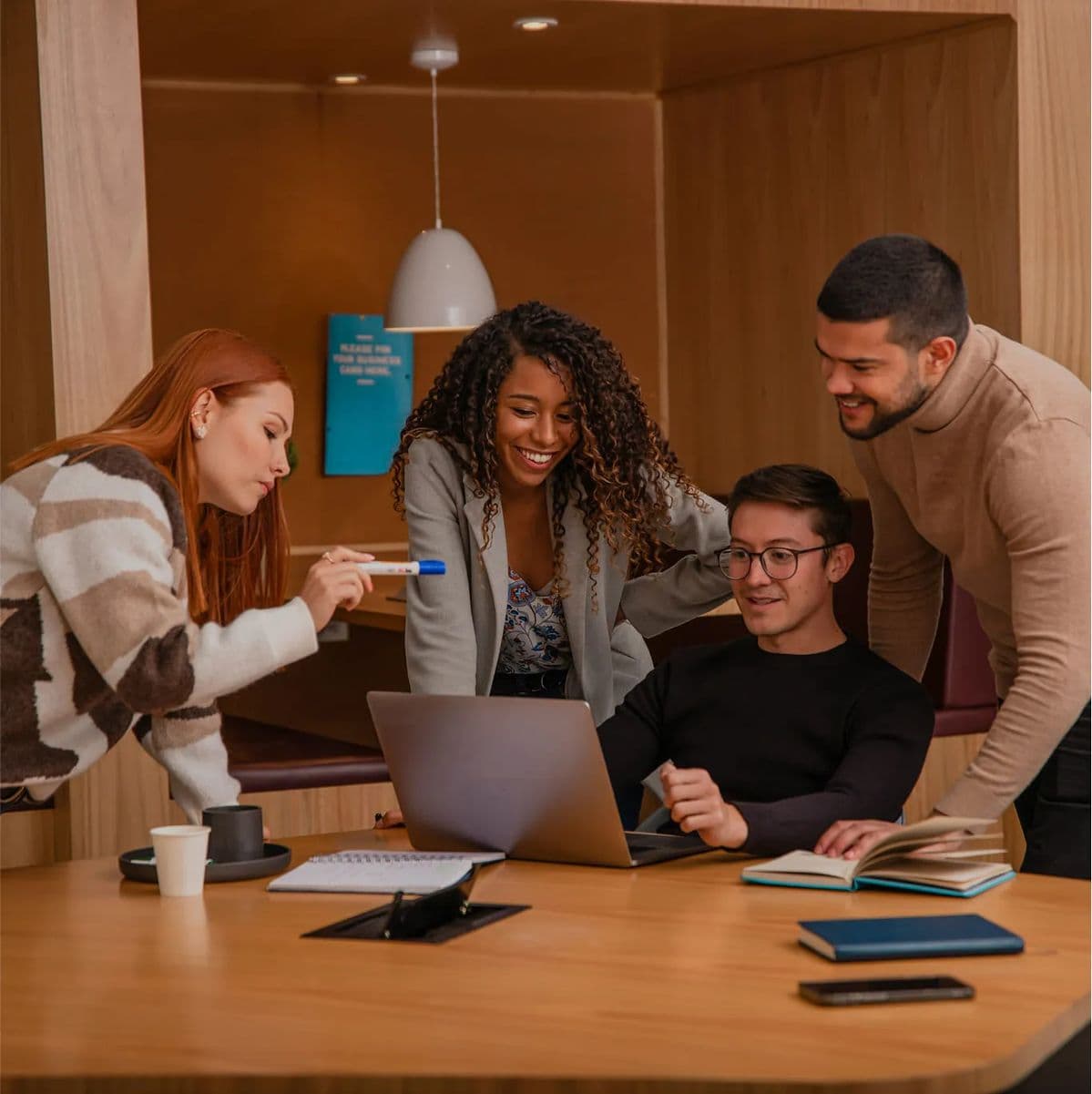 Talmow team collaborating in an office
